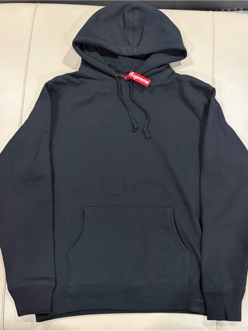 Supreme Black Hoodie with Red Neck Tag